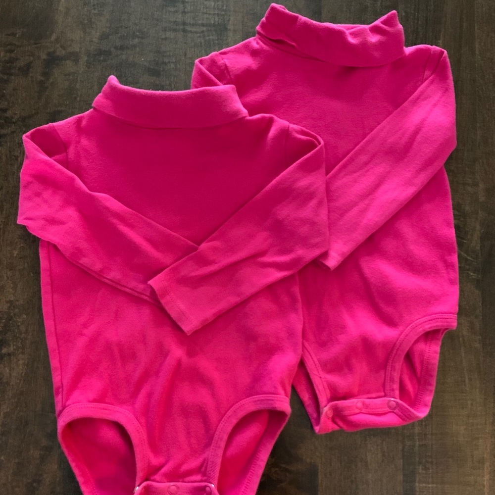 Carter’s pink turtleneck onesie